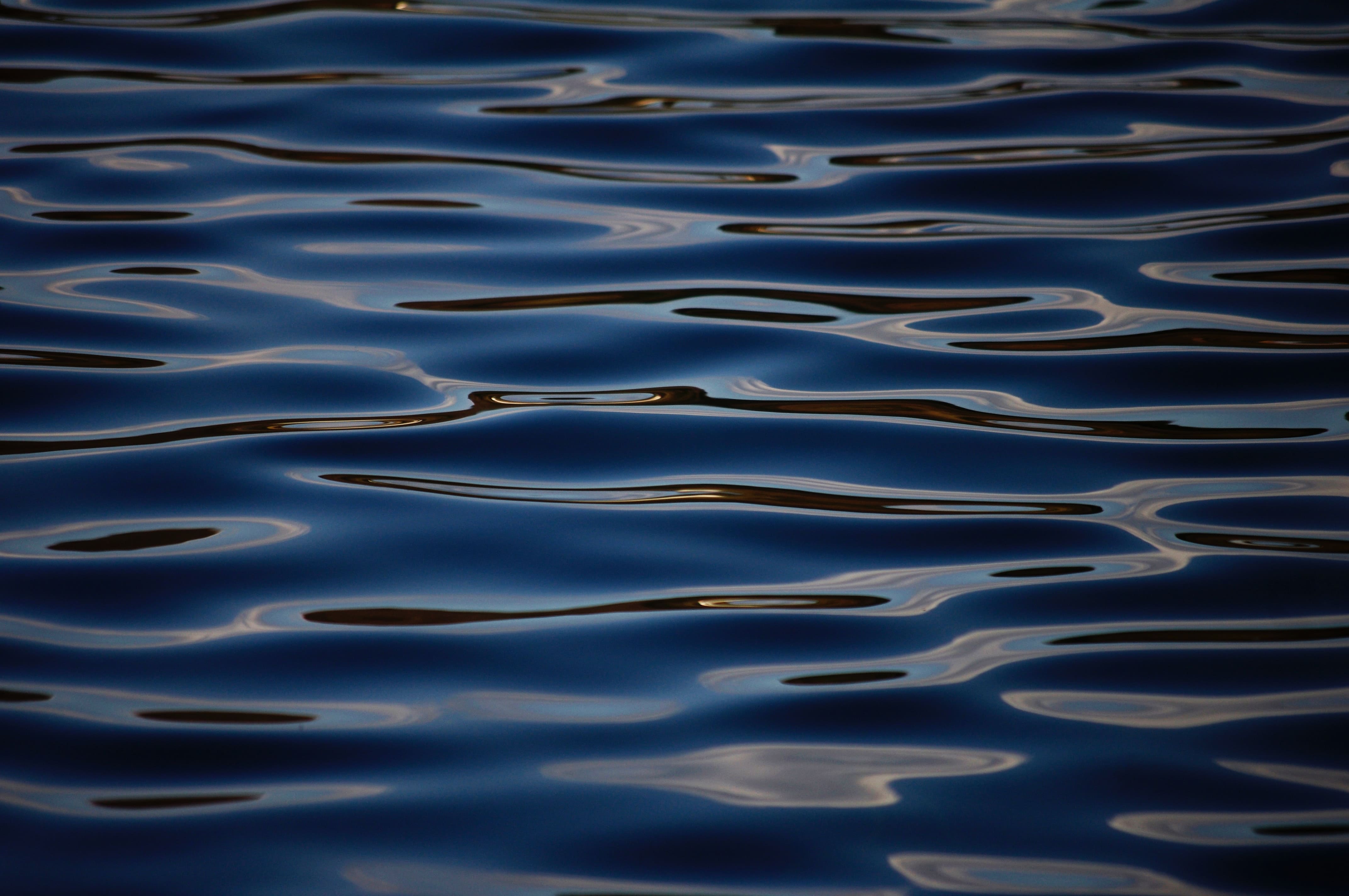 Dark blue water with gentle ripples on the surface